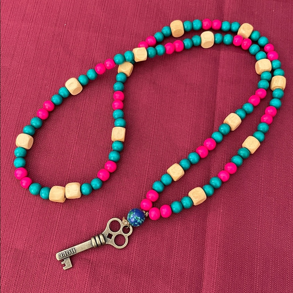 Hand assembled beaded necklace hope key
